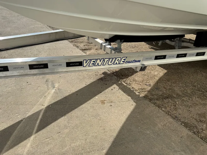 Slide: The Image of Trailer for 2009 Formula 240 Bowrider boat, featuring Venture Custom branding. - 35