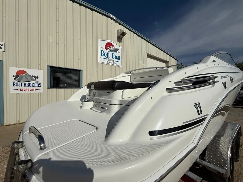 Slide: The Image of 2009 Formula 240 Bowrider boat on trailer outside Boji Boat Brokers building. - 6