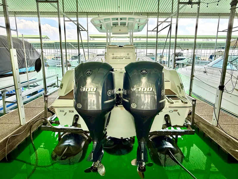 Slide: The Image of 2017 Sea Fox 288 Commander with twin 300 HP engines docked in a marina. - 21