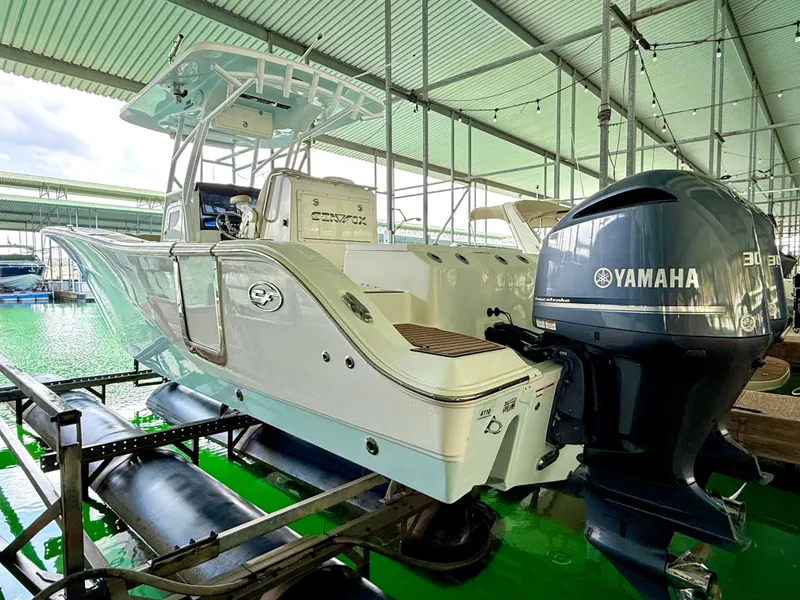 Slide: The Image of 2017 Sea Fox 288 Commander boat with Yamaha engine in covered dock. - 22