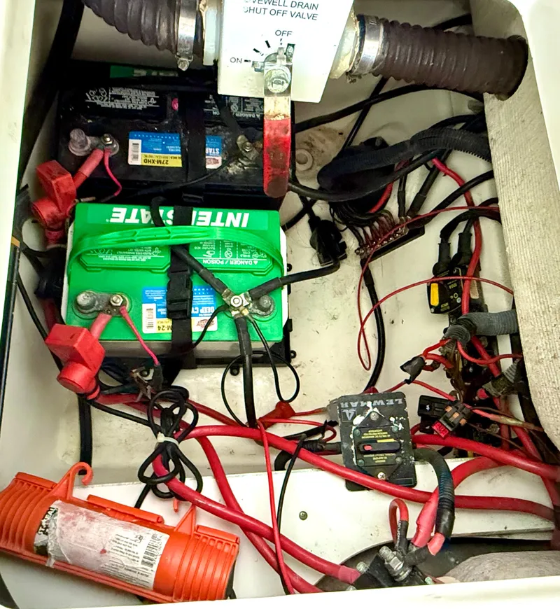 Slide: The Image of Battery compartment of 2017 Sea Fox 288 Commander with wiring and components. - 28