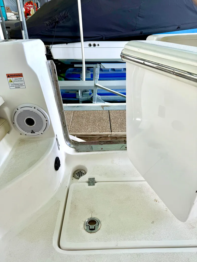 Slide: The Image of 2017 Sea Fox 288 Commander boat interior with open hatch and speaker. - 30