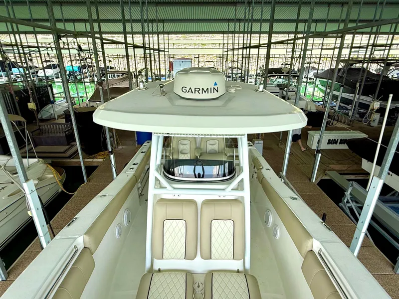 Slide: The Image of 2017 Sea Fox 288 Commander boat with Garmin equipment in a marina. - 31