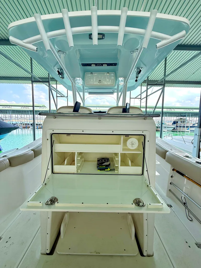 Slide: The Image of 2017 Sea Fox 288 Commander boat interior with storage compartments and seating. - 32