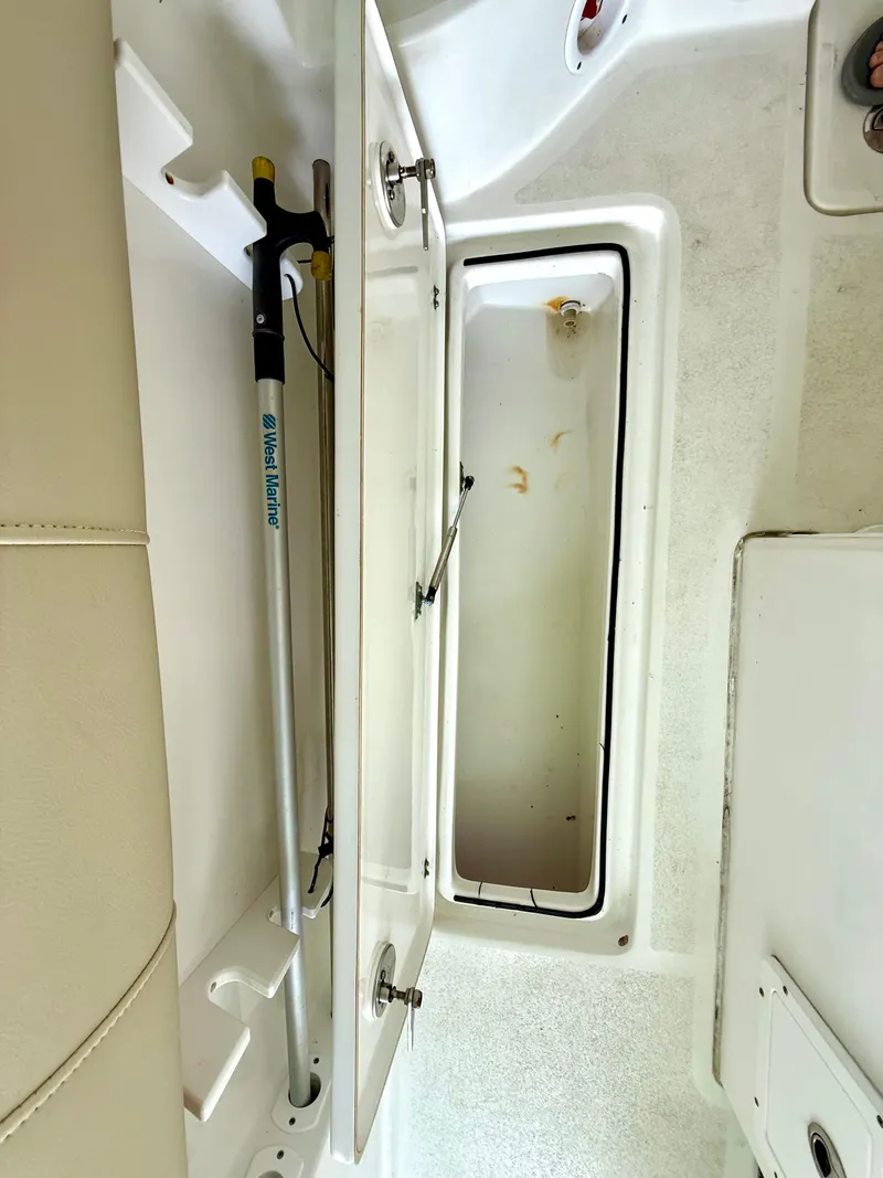 Slide: The Image of 2017 Sea Fox 288 Commander storage compartment with open hatch and hydraulic support. - 34