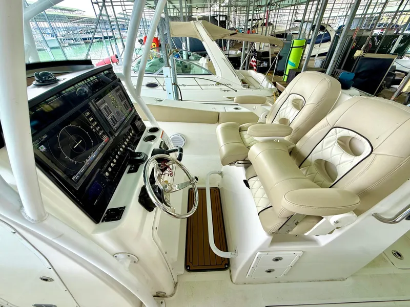 Slide: The Image of 2017 Sea Fox 288 Commander boat interior with dual helm seats and advanced navigation system. - 35