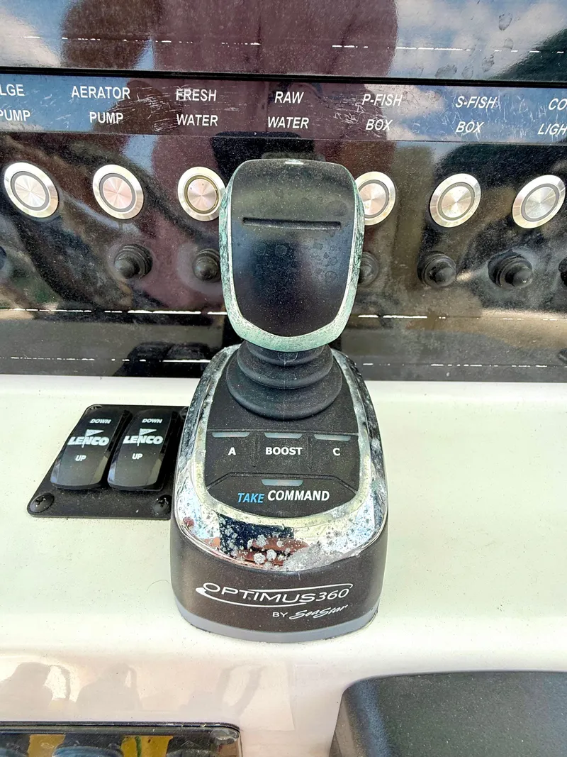Slide: The Image of Optimus 360 joystick control on 2017 Sea Fox 288 Commander boat dashboard. - 49
