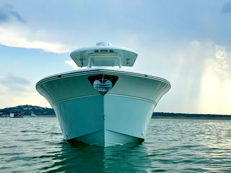 Slide: The Image of 2017 Sea Fox 288 Commander boat on calm water under a cloudy sky. - 7
