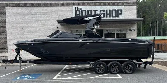 Slide: The Image of 2019 Centurion Fi 25 boat on trailer outside The Boat Shop. - 0