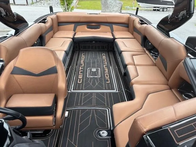 Slide: The Image of Luxurious interior of a 2019 Centurion Fi 25 boat with tan leather seating. - 7