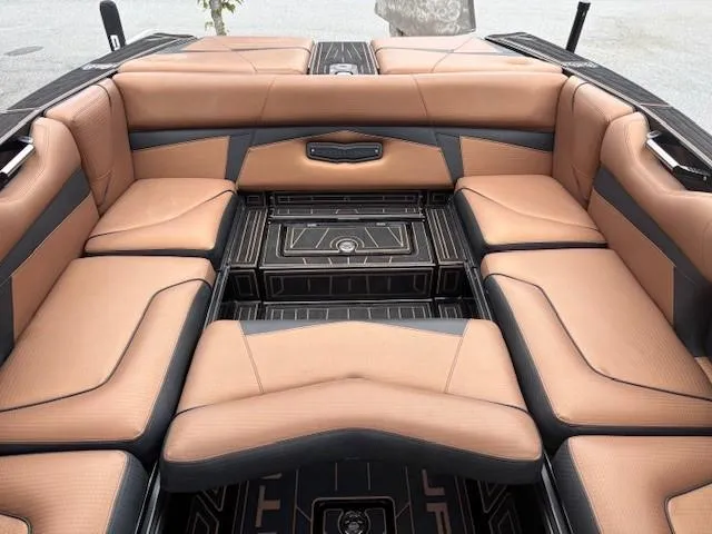 Slide: The Image of Luxurious interior of a 2019 Centurion Fi 25 boat with tan leather seating. - 8
