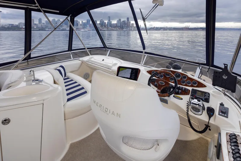 Slide: The Image of 2008 Meridian 391 Sedan yacht interior with city skyline view. - 10