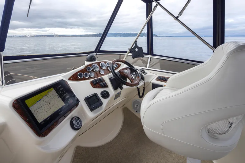 Slide: The Image of Helm of 2008 Meridian 391 Sedan yacht with navigation equipment and steering wheel. - 13