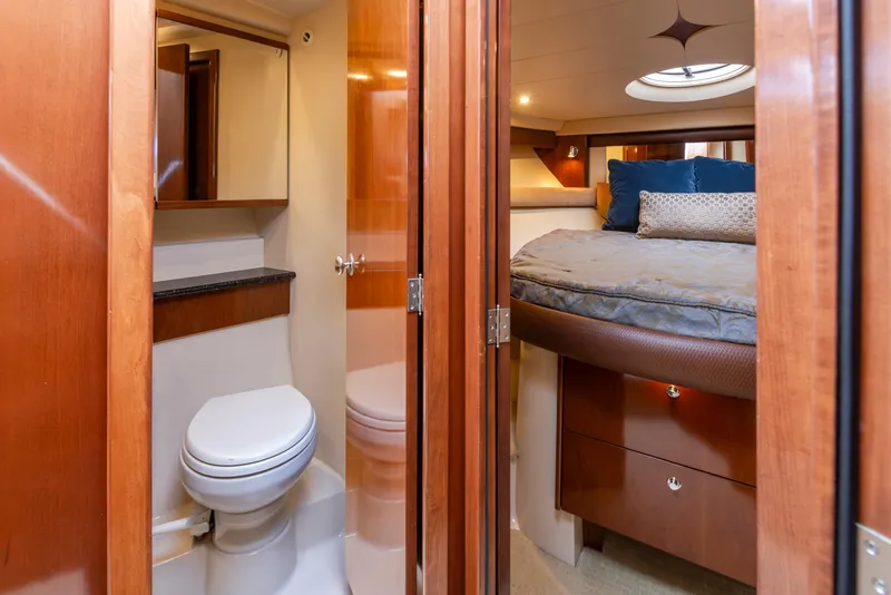 Slide: The Image of Luxurious interior of 2008 Meridian 391 Sedan yacht with bedroom and bathroom. - 24