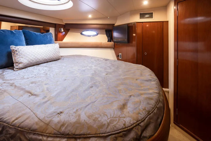 Slide: The Image of Luxurious bedroom interior of 2008 Meridian 391 Sedan yacht with elegant bedding. - 26
