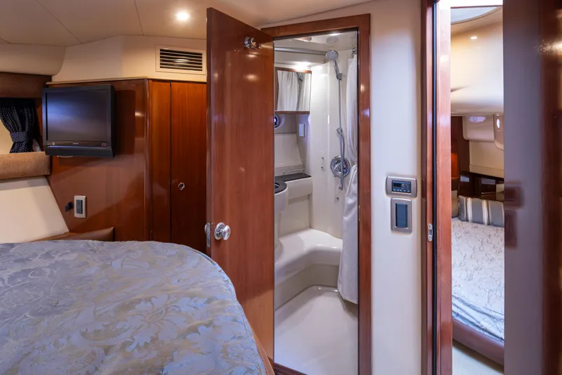 Slide: The Image of Interior of 2008 Meridian 391 Sedan yacht featuring bedroom and bathroom. - 28