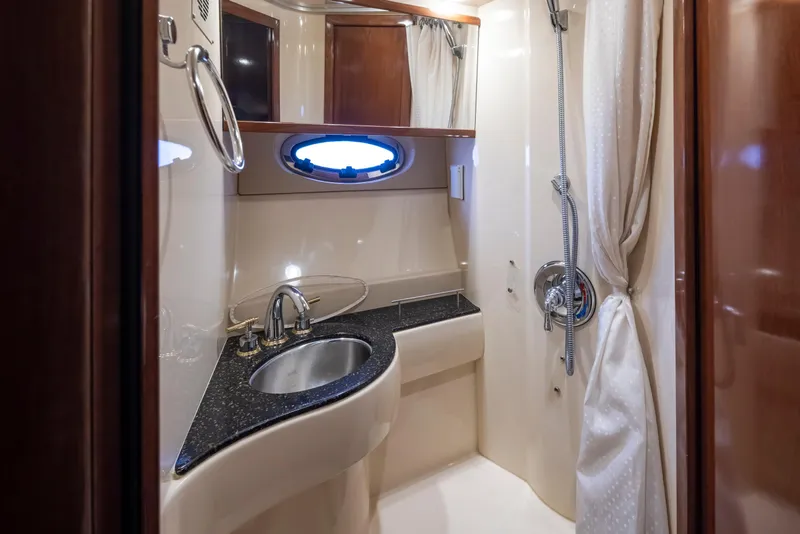 Slide: The Image of Luxurious bathroom in 2008 Meridian 391 Sedan yacht with modern fixtures and elegant design. - 29
