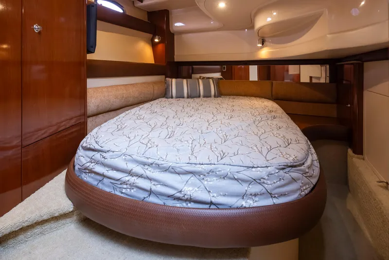 Slide: The Image of Luxurious bedroom interior of 2008 Meridian 391 Sedan yacht with elegant bedding. - 33