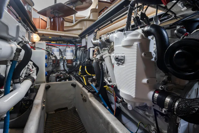 Slide: The Image of Engine room of a 2008 Meridian 391 Sedan yacht, showcasing mechanical components and systems. - 39