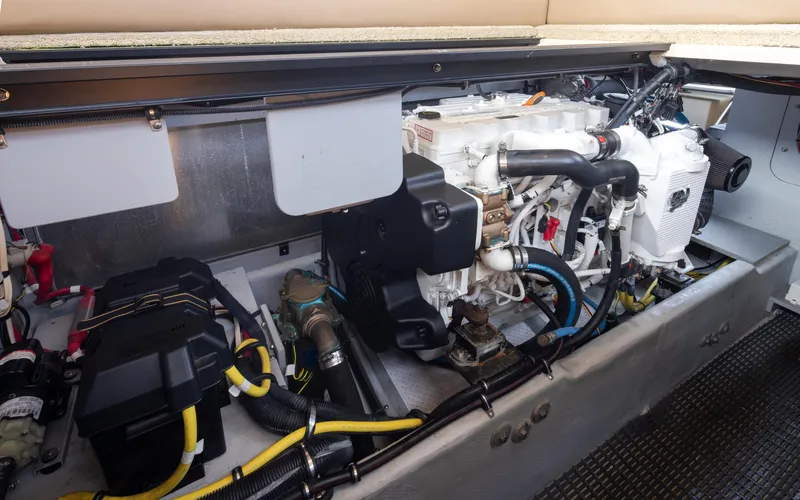 Slide: The Image of Engine compartment of a 2008 Meridian 391 Sedan, showcasing mechanical components and wiring. - 42