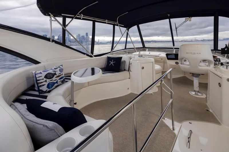 Slide: The Image of Luxurious 2008 Meridian 391 Sedan yacht interior with plush seating and modern helm. - 8