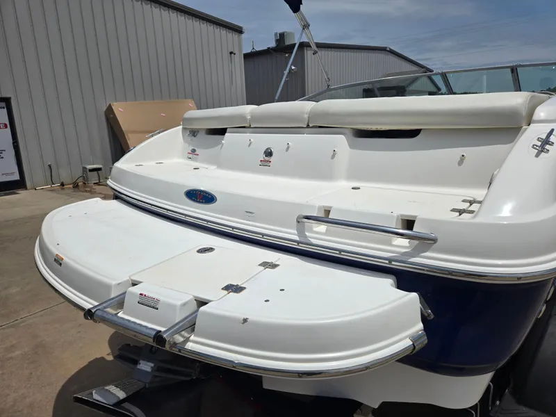Slide: The Image of 2007 Chaparral 210 SSi boat rear view with swim platform and seating. - 18