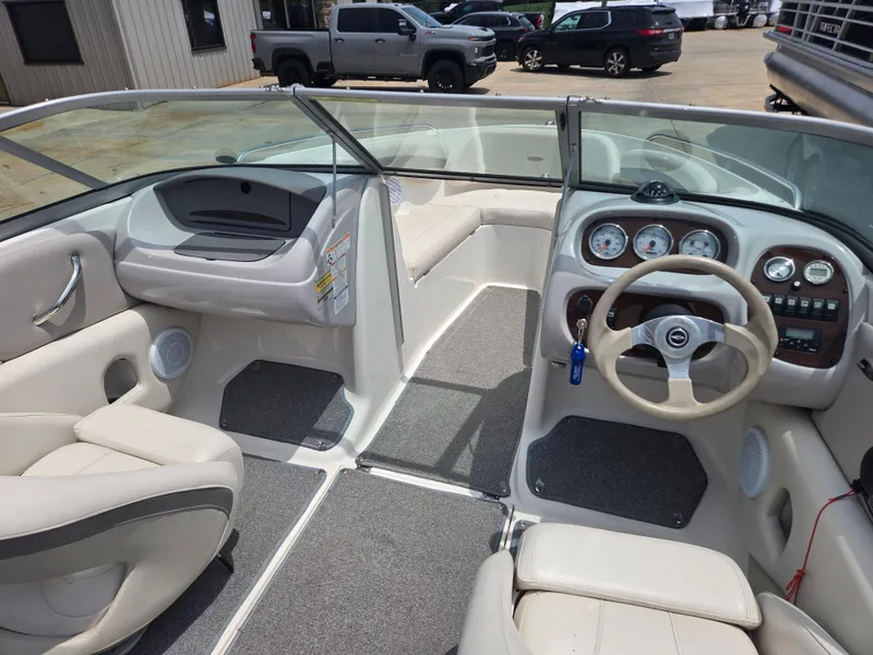Slide: The Image of 2007 Chaparral 210 SSi boat interior with steering wheel and dashboard. - 5