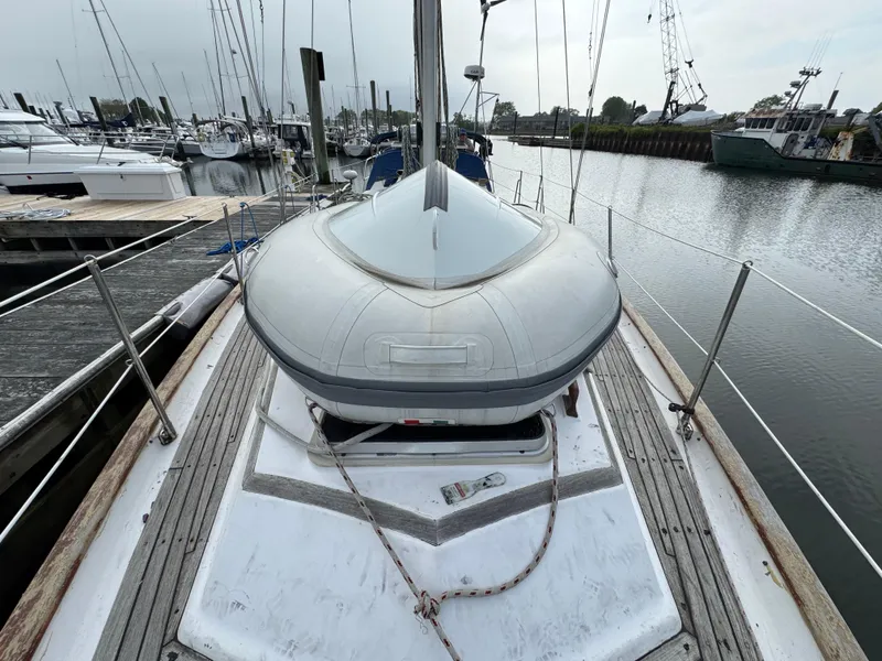 Slide: The Image of Sailboat deck view, Passport 40 model, 1982, docked in a marina. - 11