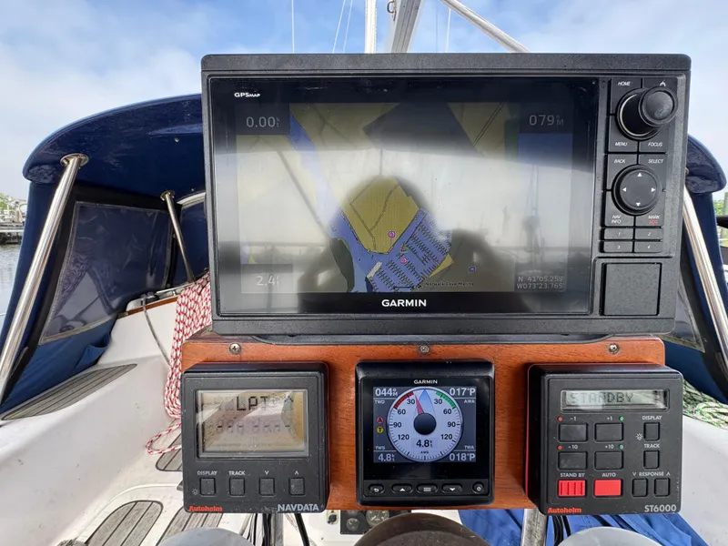 Slide: The Image of Sailboat cockpit with Garmin navigation system, Passport 40, 1982 model. - 17