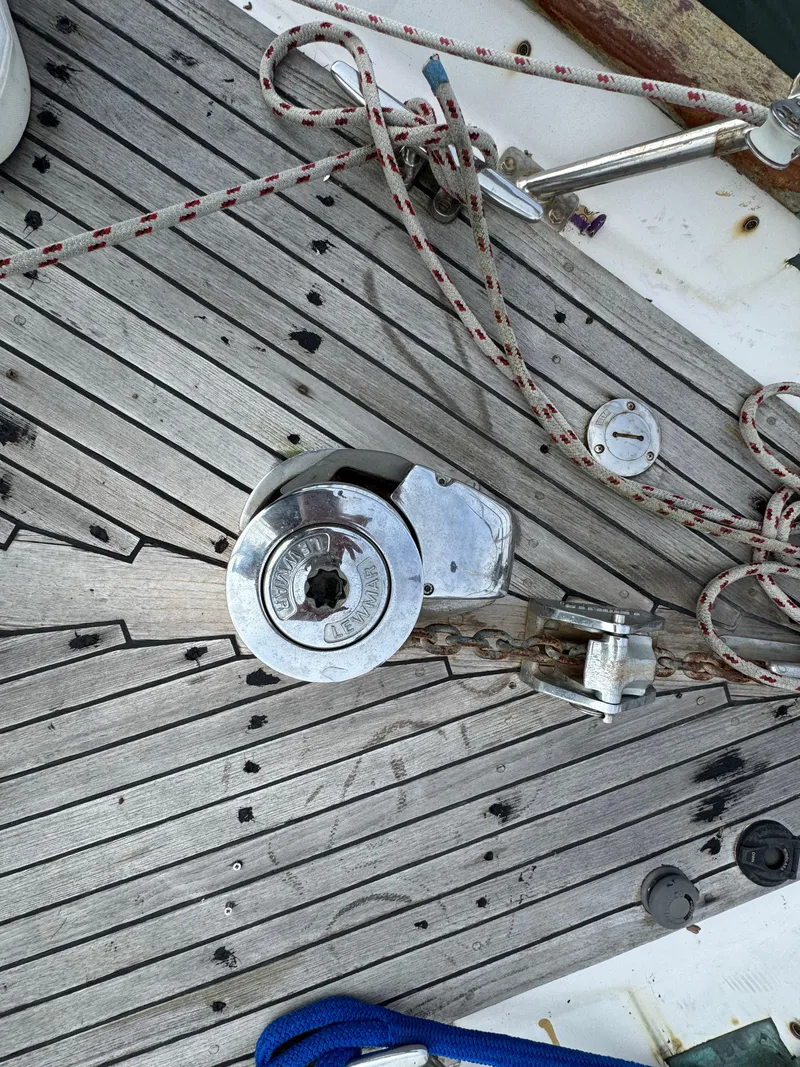 Slide: The Image of Deck of 1982 Passport 40 sailboat with winch and ropes. - 9