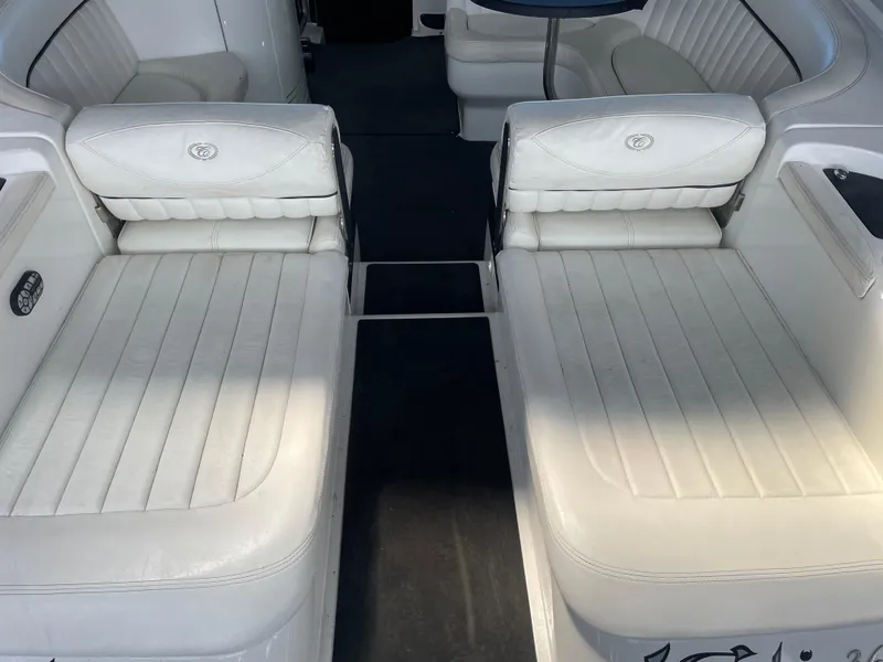 Slide: The Image of 2004 Cobalt 360 boat interior with white leather seating and elegant design. - 13