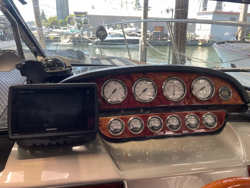 Slide: The Image of Dashboard of a 2004 Cobalt 360 boat with gauges and Garmin GPS. - 7