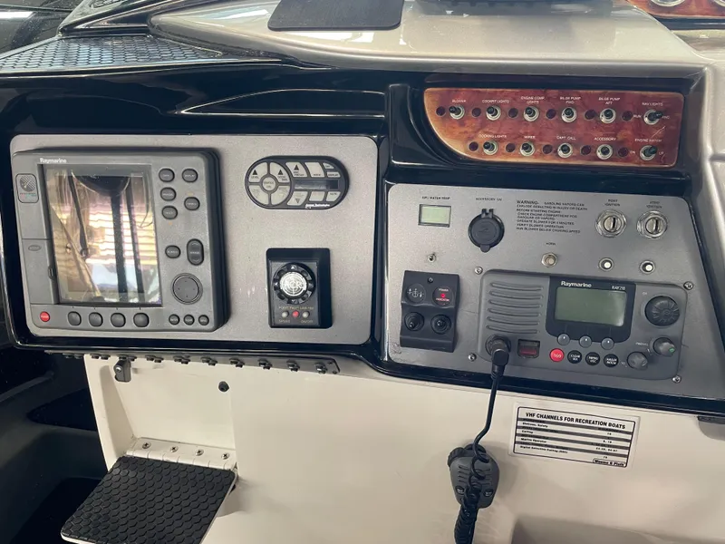 Slide: The Image of Control panel of a 2004 Cobalt 360 boat with navigation and communication equipment. - 8