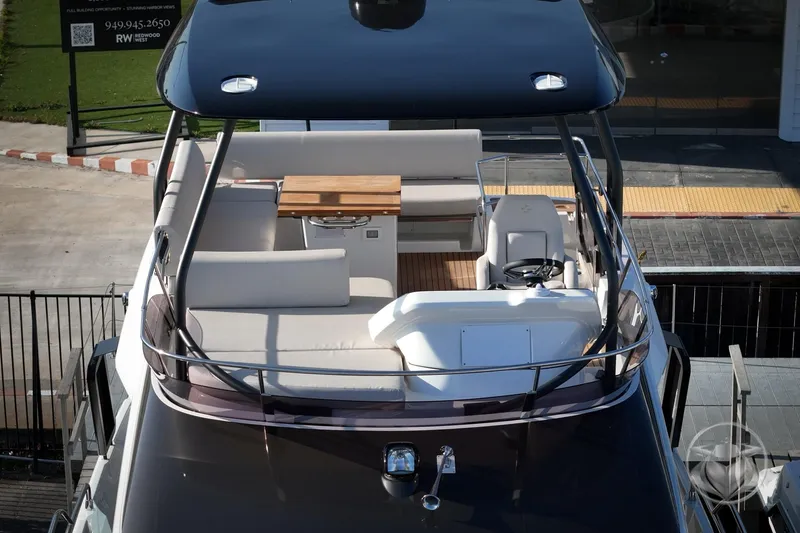 Slide: The Image of Prestige F4.3 yacht 2026 model, featuring a sleek deck and modern seating area. - 12