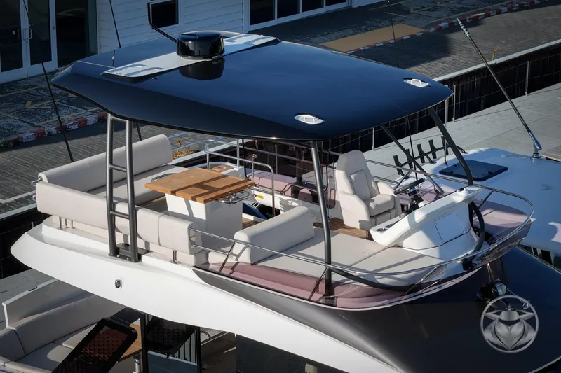Slide: The Image of Luxurious 2026 Prestige F4.3 yacht with spacious seating and sleek design. - 13