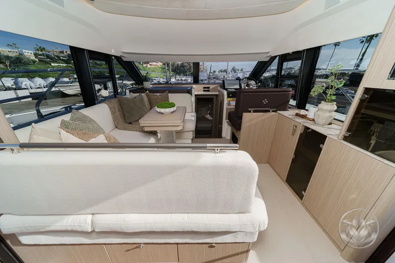 Slide: The Image of Luxurious interior of 2026 Prestige F4.3 yacht with elegant seating and modern decor. - 28