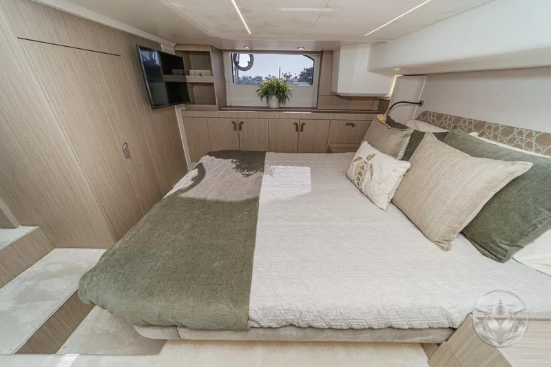 Slide: The Image of Luxurious bedroom interior of 2026 Prestige F4.3 yacht with modern decor and cozy bedding. - 39
