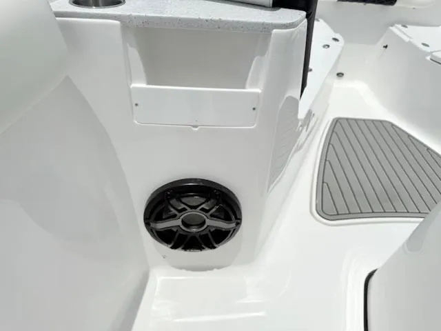 Slide: The Image of 2026 Tidewater 302 CC Adventure boat interior with speaker and non-slip flooring. - 12