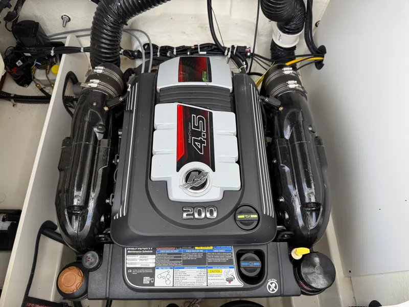 Slide: The Image of 2021 Bayliner VR5 engine compartment with MerCruiser 4.5L 200 HP engine. - 22