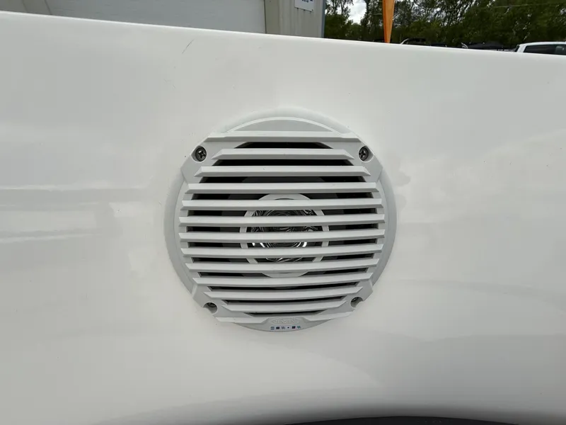 Slide: The Image of White speaker on a 2021 Bayliner VR5 boat. - 27