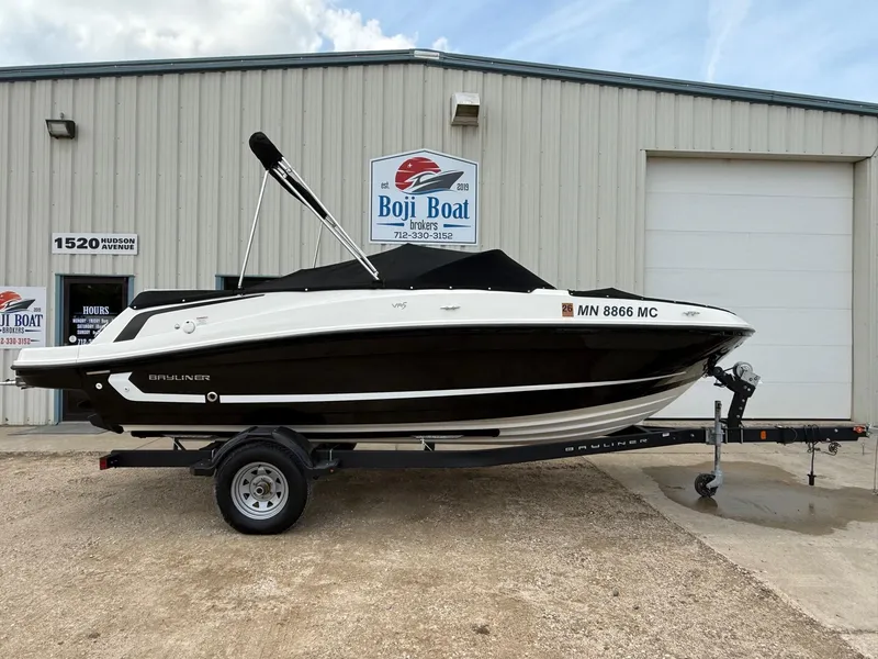 Slide: The Image of 2021 Bayliner VR5 boat on trailer outside Boji Boat building. - 31