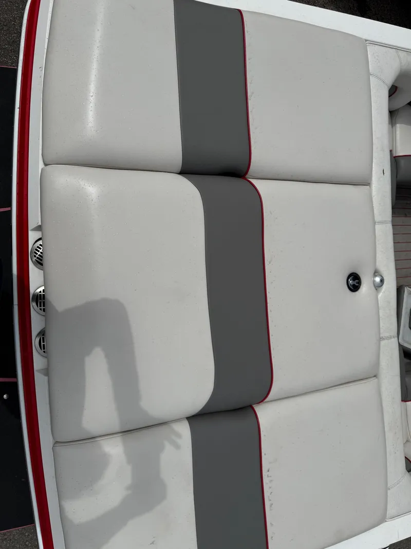 Slide: The Image of 2007 Supra Launch 20 SSV boat seat with gray and white upholstery. - 5