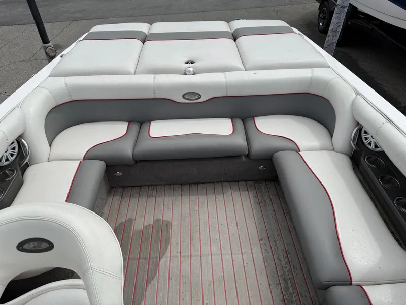 Slide: The Image of 2007 Supra Launch 20 SSV boat interior with gray and white seating. - 7