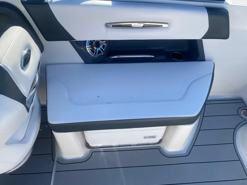 Slide: The Image of 2021 Chaparral 287 SSX boat interior with seating and speaker detail. - 8