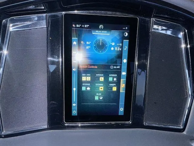 Slide: The Image of Touchscreen control panel of 2022 Regency 250 LE3 Sport boat. - 22