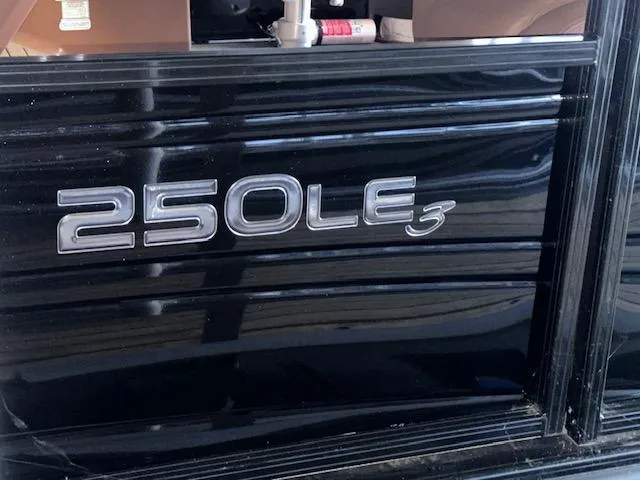 Slide: The Image of 2022 Regency 250 LE3 Sport logo on black panel. - 27