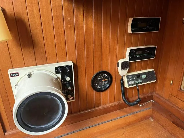 Slide: The Image of Control panel of 1983 Bluewater Vagabond 47 yacht with navigation instruments. - 16