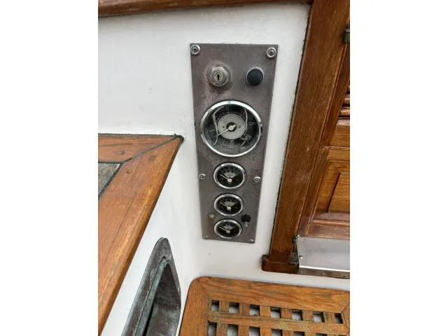 Slide: The Image of Control panel on 1983 Bluewater Vagabond 47 sailboat with wooden trim. - 33