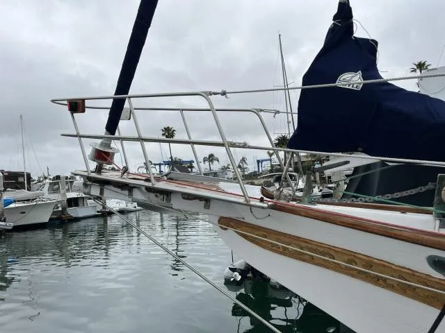 Slide: The Image of Sailboat docked in marina, Bluewater Vagabond 47, 1983 model, overcast sky. - 41