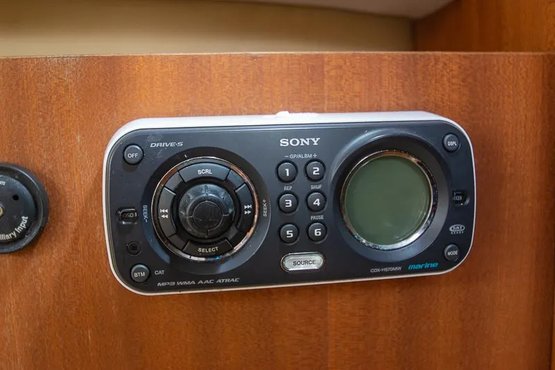 Slide: The Image of Sony marine audio system on 2009 Pro-Line 35 Express boat, mounted on wooden panel. - 17